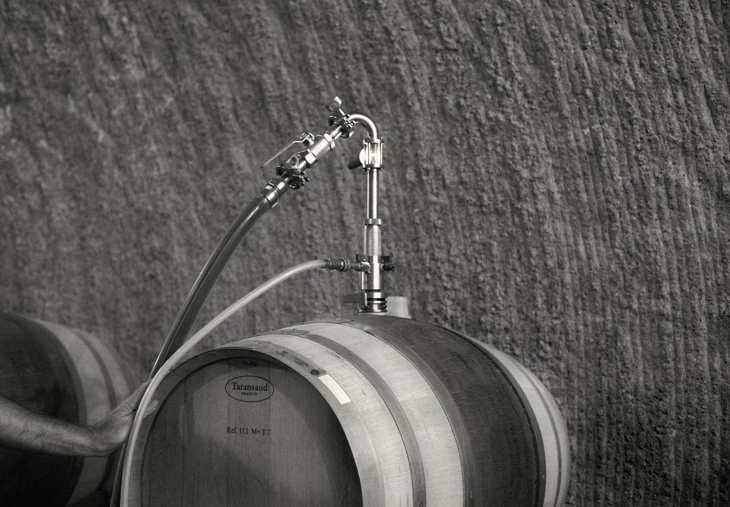 barrel with hose attached